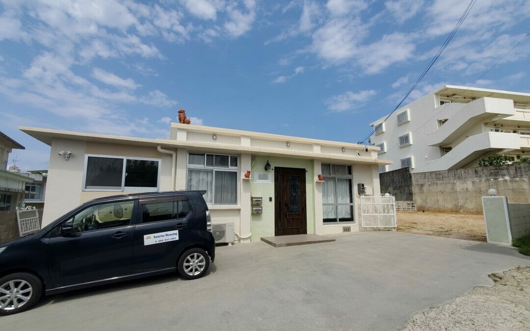 Modern one story single house with fenced yard in Yomitan